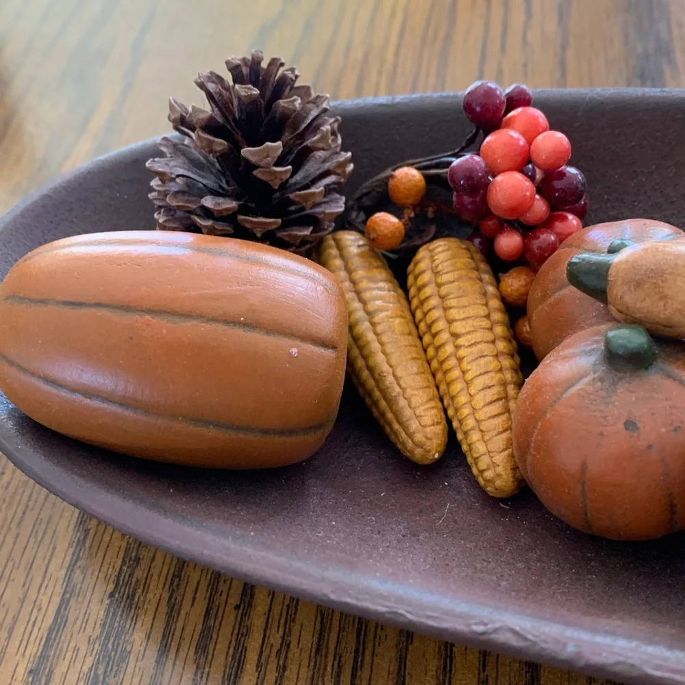 Fall-Themed Decorative Centerpiece in a long shallow bowl.